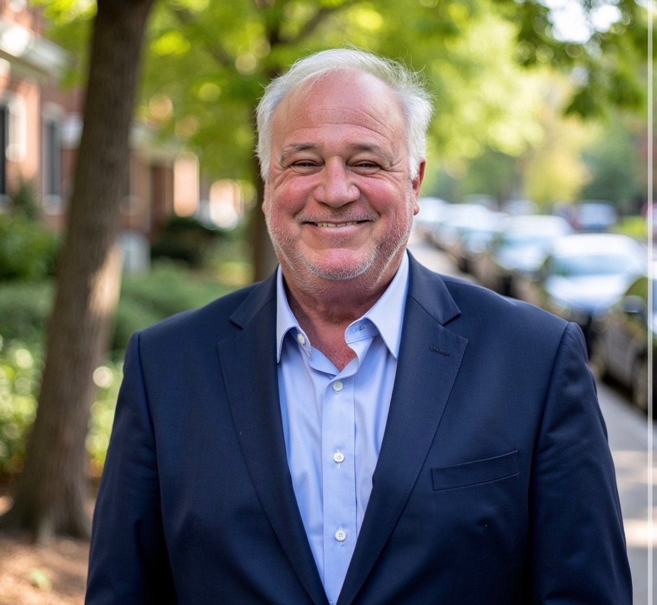 Mark Benveniste, healthcare executive and strategic advisor, in a navy blazer